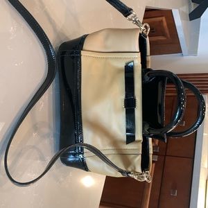 Cute Kate Spade tan leather/black patent bag with bow